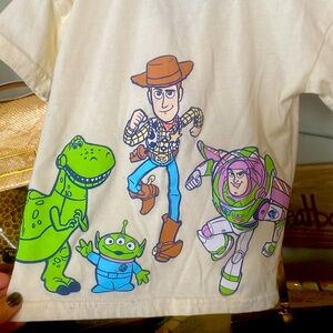 Disney Pixar Toy Story Collard Shirt Buzz Lightyear and the gang in the back